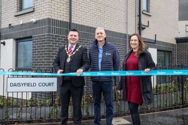 Mayor Ruairí McHugh; Damian Murray, Build Director, GEDA; and Denise Quinn, Senior Head of Development, Radius Housing; pictured at Radius Housing’s new Daisyfield Court development.