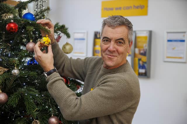 He met with patients, families and staff of the end-of-life charity, and helped decorate their Christmas tree.