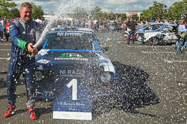Joe Hegarty celebrates his two-wheel-drive title in the Brown and Brown Northern Ireland Rally Championship.