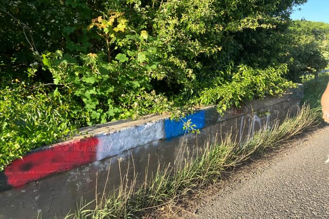 Outside St. Patrick's and St. Joseph's Primary School, on the Churchtown Road outside Garvagh, both the bridge and signage has been sprayed with sectarian graffiti, including support for the UDA and FTP. 