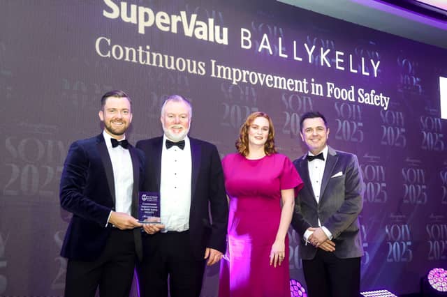 Conor and John Moran from SuperValu Ballykelly (second from left). They are joined by Joanne Bertenshaw from Musgrave’s Food Safety and Quality team and awards host Pete Snodden.