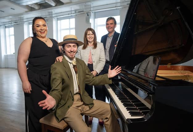 Minister Archibald with Mark McLaughlin and Niamh Morrison, young artists who benefitted from professional training and skills development at The Playhouse, alongside Kevin Murphy, Chief Executive.