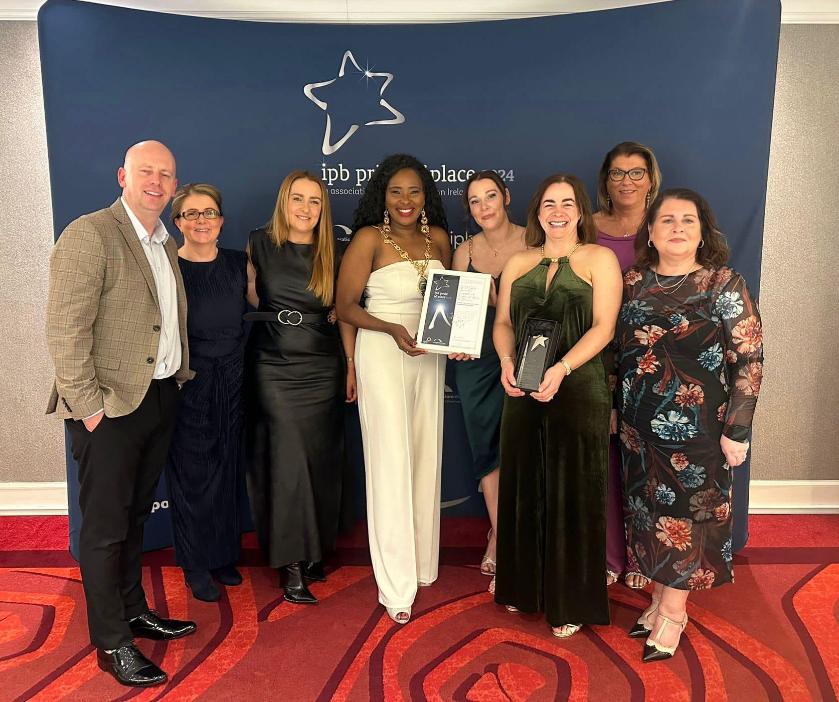 Mayor of Derry City and Strabane District Council, Councillor Lilian Seenoi-Barr with representatives from DEEDS at the 2024 Pride of Place Awards