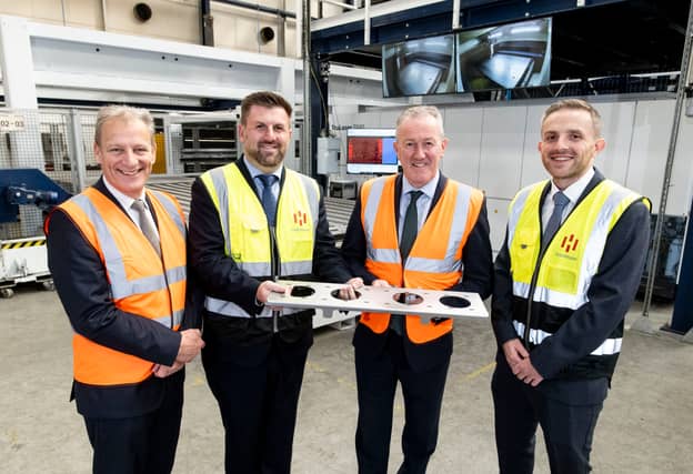 Jeremy Fitch, Director of Business Growth Group, Invest NI; Mark Hutchinson, CEO, Hutchinson; Economy Minister Conor Murphy; and Richard Hutchinson, Innovation Director, Hutchinson.