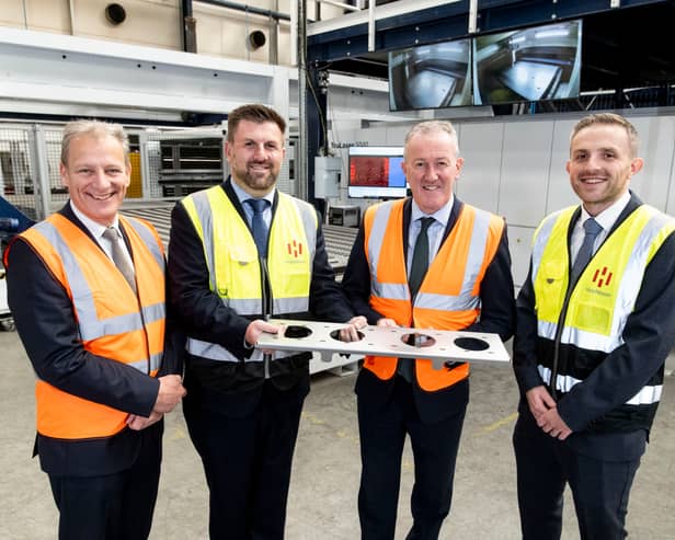 Jeremy Fitch, Director of Business Growth Group, Invest NI; Mark Hutchinson, CEO, Hutchinson; Economy Minister Conor Murphy; and Richard Hutchinson, Innovation Director, Hutchinson.