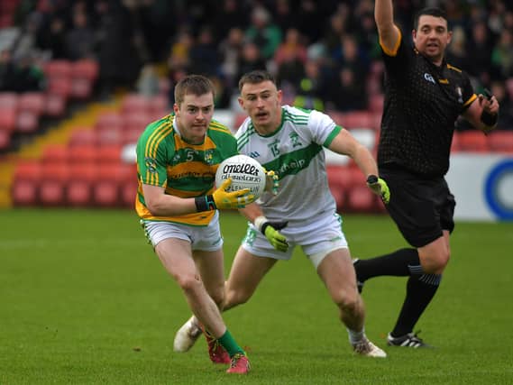 Con Magee's Eamon Fyfe chases Glenullin's Cormac Hasson. Photo: George Sweeney, nwpresspics