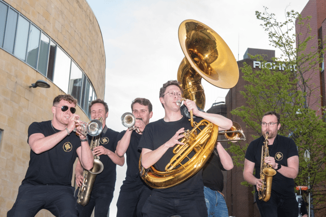 The Hyde Park Brass Band were just one of the new acts to join the Jazz Festival line up this year as they took part in impromptu street performance