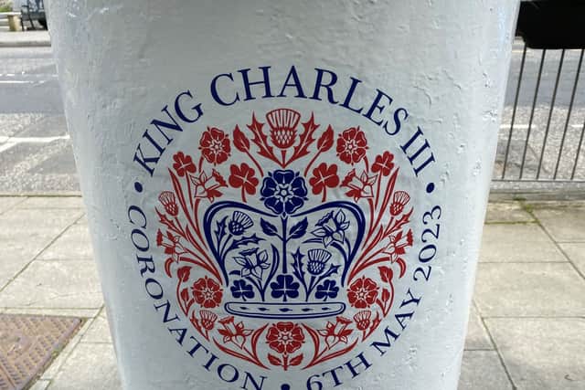 The boxes – in Westminster, central London; Edinburgh; Cardiff; and Hillsborough, Northern Ireland – display the occasion’s official emblem.
