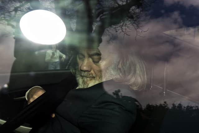 He was met with a huge crowd of media before leaving in a taxi.
