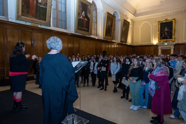 Pictured is Trinity's Provost Linda Doyle addressing students and their former principals in the Public Theatre (Paul Sharp)
