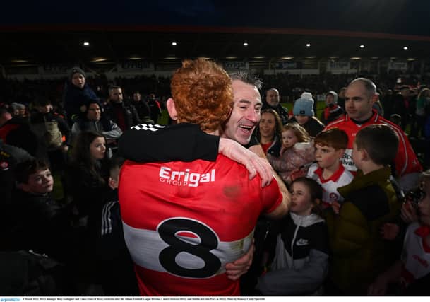 Rory Gallagher and Conor Glass embrace after Derry beat Dublin at Celtic Park. Pic by Seb Daly/ Sportsfile