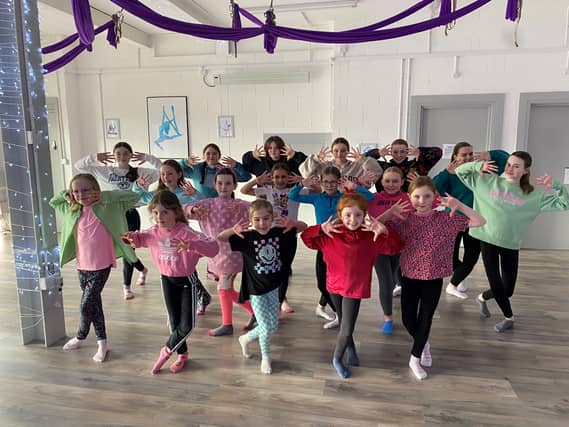 Create Dance Academy preparing for the city’s Spring Carnival Parade at Dragonfly Studios.