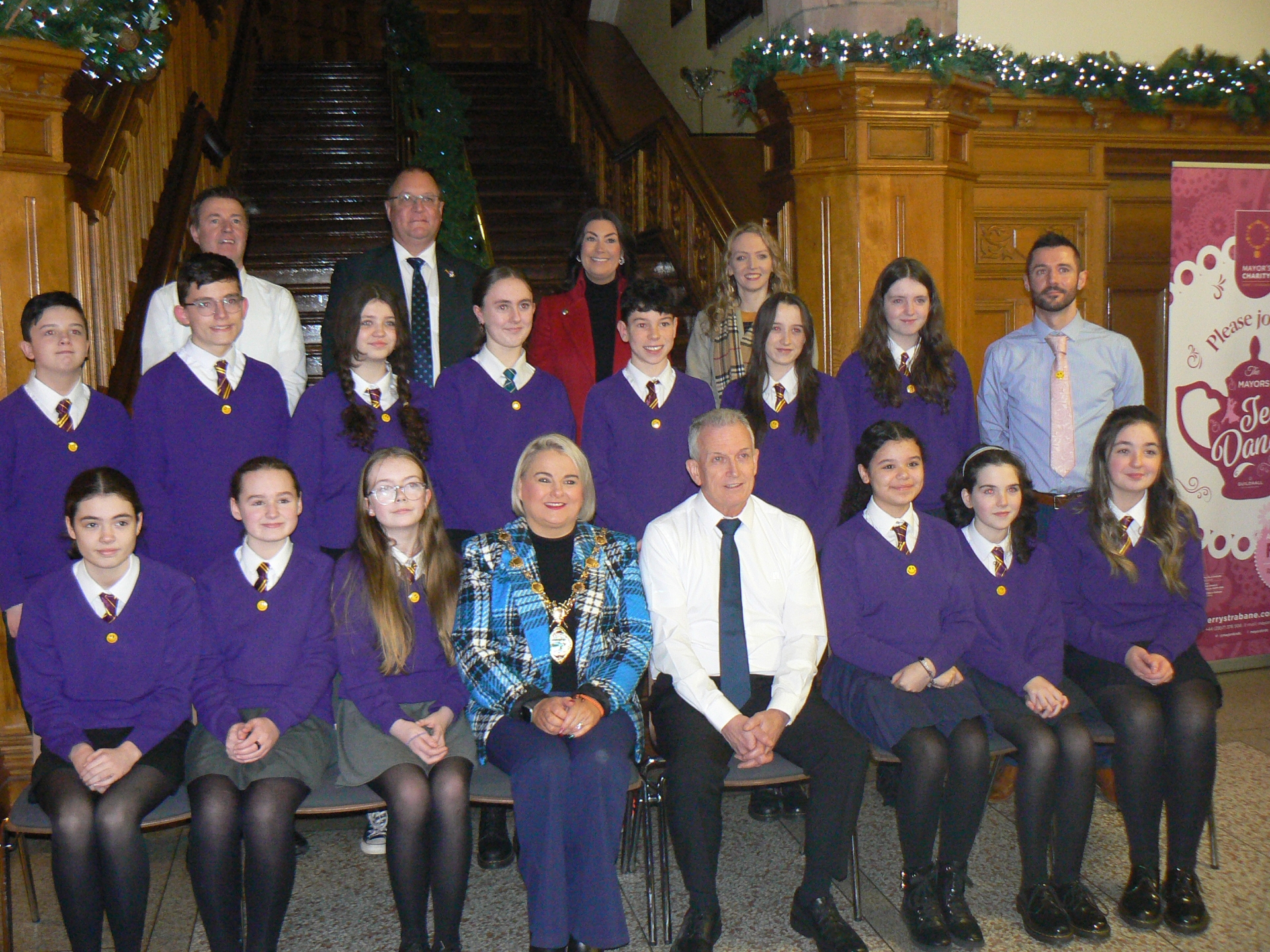 Cast members of Saint Saviour's College during a visit to Derry's Guildhall pictured with the Mayor of Derry and Strabane, Councillor Sandra Duffy.