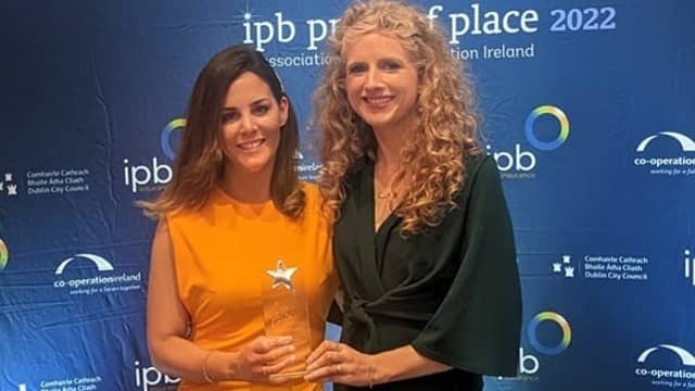 Christine McBride and Rhonda Wooler from Minding Mum with their Pride of Place awards.