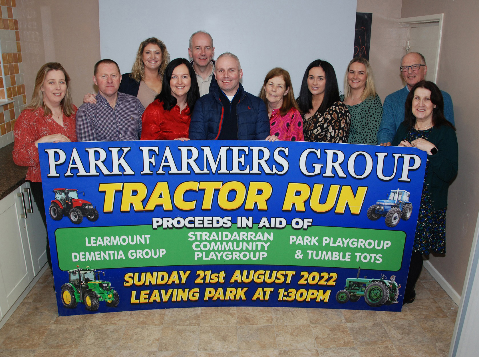 Committee members of Park Farmers' Group pictured with representatives from the four organisations which shared in the fundraising total of £16,000.
