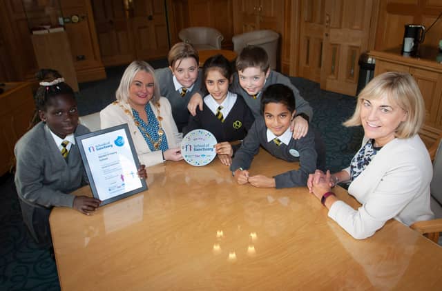 The Mayor of Derry City and Strabane District Council, Sandra Duffy pictured with Mrs. Michelle Ramsey and pupils from the Model Primary School. (Photos: Jim McCafferty Photography)