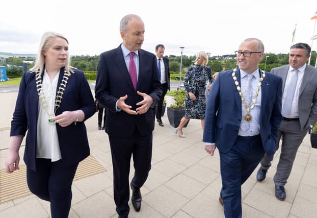 Left to right, President of the Letterkenny Chamber of Commerce, Kristine Reynolds, Taoiseach Micheál Martin and President of the Derry Chamber of Commerce, Aidan O’Kane.