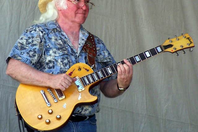 "As soon as I could, I bought my first electric guitar. The guitar had no manufacturer's name on it so it remains a mystery. The band played the popular country music of the period.