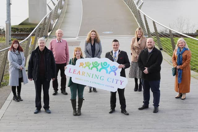 From left to right: Christine O’Kane, Padraig Canavan, Paul Hassan, Michele Murphy, Gillian Moss, Mayor of Derry and Strabane Graham Warke, Erin McFeely, Garreth Harvey, Noelle McAlinden.