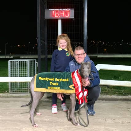 Sniper Ria, the new Track Record holder over 300 yards with her owner’s son Kealan O’Kane and grand daughter Orla Wray.
