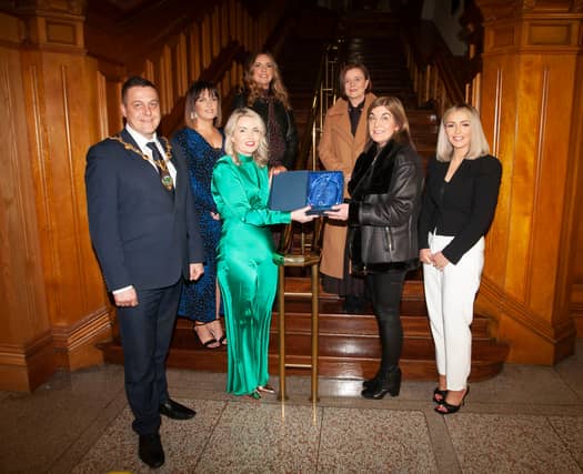 Aine Mellon receiving her award.