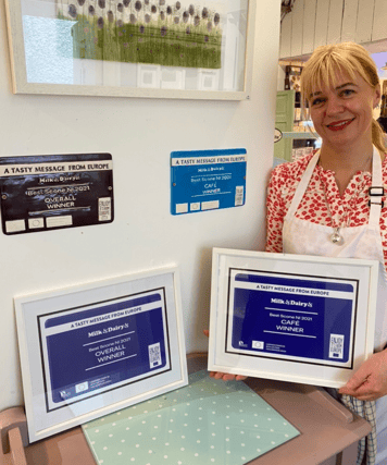 Michelle Devine at The Cottage Coffee Shop with their awards