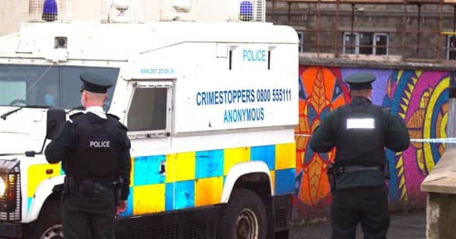 Police at the scene of a double shooting in Creggan earlier this year.