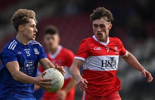 Lee Brady keeps an eye on Michael Hamill. (Pic: Piaras Ó Mídheach/Sportsfile)