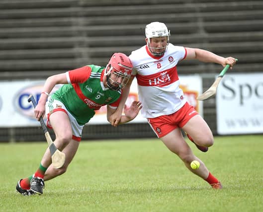Richie Mullan's move to defence was an important factor in Derry's win. (Pic: David Farrell)