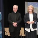 Marie Lindsay receives her award today. Photo by Tom Heaney