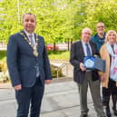 Paddy joined by his family as he receives a gift from the Mayor. Photo by Martin McKeown