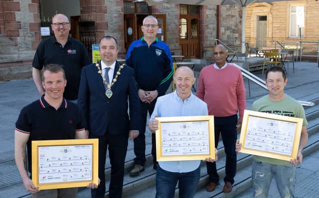 Mayor Brian Tierney who presented a framed map of the route to local cricketers on completion of the "Pedal for Patto" charity cycle (Pic: Tom Heaney/NW Press Pics)