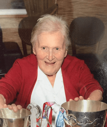The late Cissie Auld (neé Curran) celebrating her 100th Birthday in the Naomh Colmcille colours.
