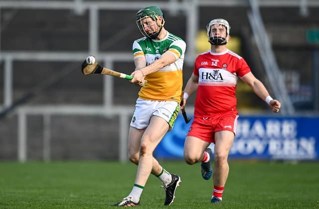 Damien Egan of Offaly in action against Cormac O'Doherty in Saturday's Christy Ring Cup game in Newry (Pic: Sam Barnes/Sportsfile)