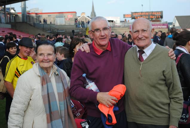 Patsy and Mary Cassidy pictured with Mickey Moran after a Derry SFC final