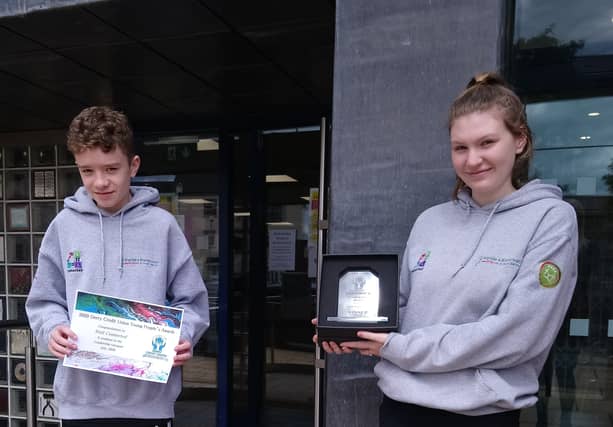 Members of the Well Connected group with their award.