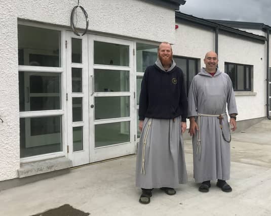 Br. Benedict and Fr Isaac in front of the St. Pio House