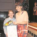 Mrs McAleese, Co-ordinator of Loreto College’s Mission Day, is presented with a gift by Head Girl Ailbhe.
