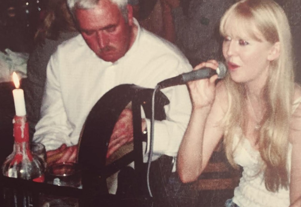 Gerald 'Doc' O'Doherty playing the bodhrán and Mandy singing during a session with the Henshaw family in Athlone many years ago.