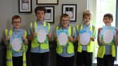 Pupils from Bellaghy Primary School show off their creative writing.