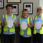 Pupils from Bellaghy Primary School show off their creative writing.