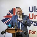 Doug Beattie in front of an UUP poster