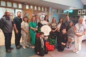 St Joseph's Uisce For Gaza coffee morning: Cllr Brian Tierney, Colum Eastwood (Foyle MP), Siobhain Grogan (Uisce For Gaza), Annmarie Meehan & Gerry mcBride (teachers), Cllrs Aisling Hutton, Patricia Logue & Pat Murphy, Marie-Therese Newton (teacher), Ciara Deane (Principal) with St Joseph's students.