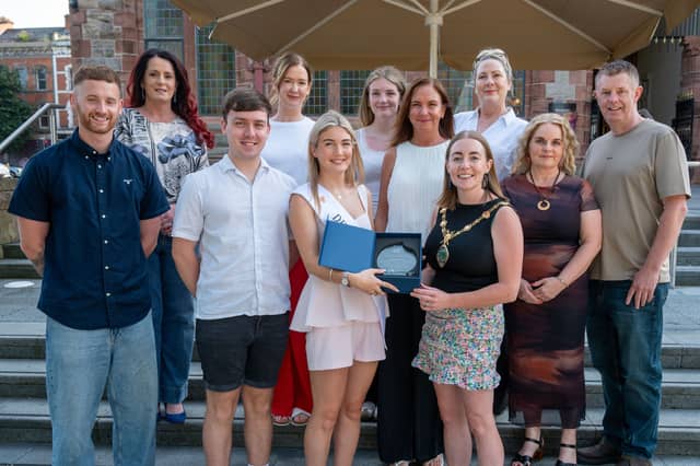 The Mayor Councillor Grace Uí Niallais pictured during a reception for Cara Hamilton in recognition of being crowned Derry Rose 2026. Cara will travel to the finals representing Derry and Na Piarsaigh Doire Trasna at the Tralee International Festival in August. The citation on the crystal commemorative gift recognises the 21 year old from Gobnascale area of the city, reads âYour achievement brings honour to our community and reflects the spirit, grace and pride of the people of Derry.
Pictured with Cara are members of her family and friends, Christopher McCloskey, Dawn Connor, Emmett McCallion, Teresa Frazer, Kate Hamilton, Una Hamilton, Cara's mum, Annemarie McCallion, Donna Jones and Mark McCloskey.