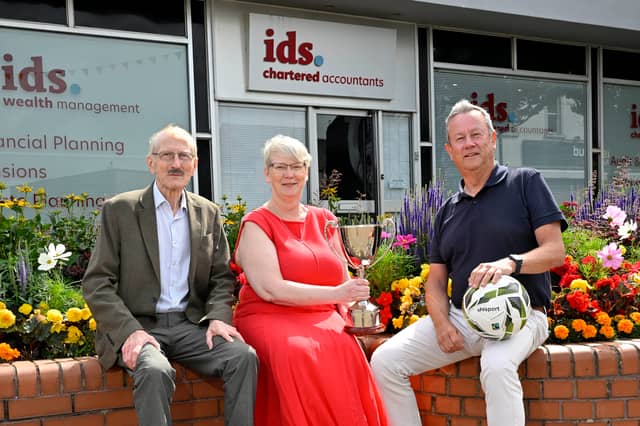 Roger Dallas, Partner at IDS Chartered Accountants, Victor Leonard, Chairperson of the Budget Energy SuperCupNI and Alison Wallace, Partner at IDS Chartered Accountants, celebrate 30 years of partnership between IDS Chartered Accountants and the Budget Energy SuperCupNI ahead of the 43rd edition of the internationally renowned youth football tournament.