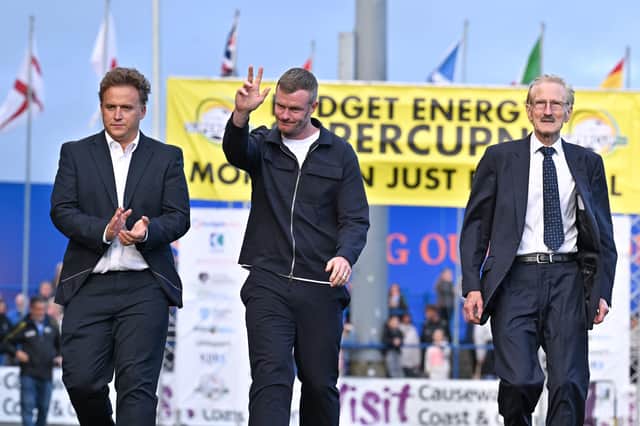 Chris Brunt and Karl Bradley from Budget Energy pictured with Victor Leonard from Budget Energy SuperCupNI