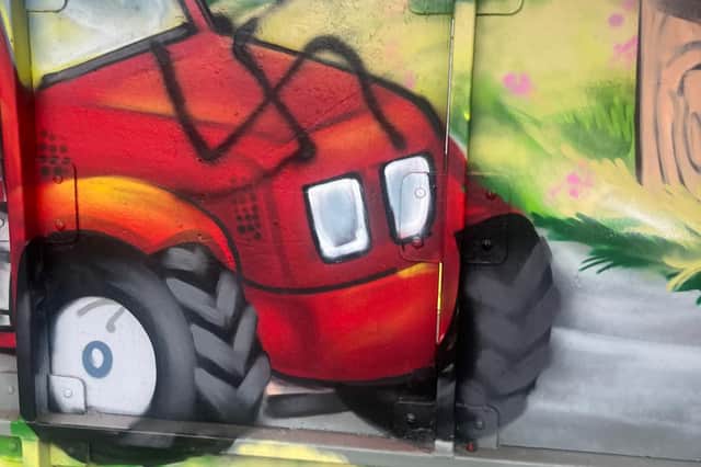 Offensive graffiti spray painted on bus stop in Eglinton.