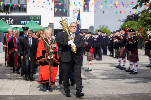 Causeway Coast and Glens Borough Council Mace Bearer Stephen McCloskey leads the Council party during the parade for the conferment of the Freedom of the Borough on the NI Prison service held in Limavady today.