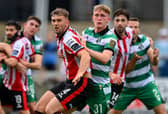 Jamie Stott of Derry City and Michael Noonan of Shamrock Rovers tussle during the SSE Airtricity Mens Premier Division match at The Ryan McBride Stadium on Sunday.
