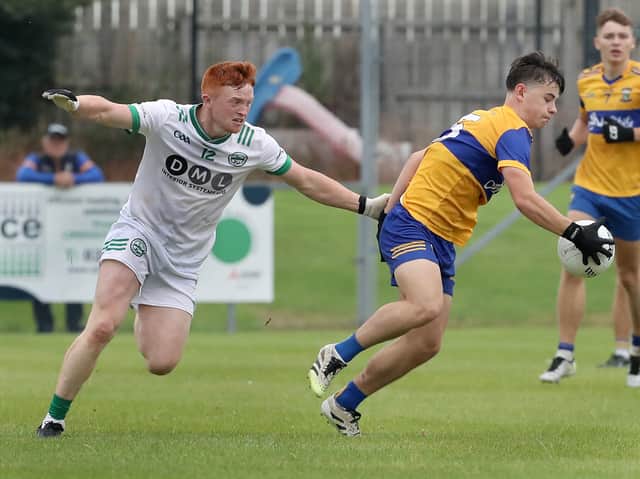 Limavady's Finlay Doherty with Fergal Mortimer of Craigbane.